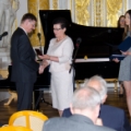 Mrs. Wiesława Krawczyk, Deputy Chairwomen of the Mazovia Voivodeship Regional Council is handing over the Merit for Mazovia honour awarded to NCBJ to Professor Grzegorz Wrochna, NCBJ Director General (photo Marcin Jakubowski)