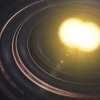 Artist's vision of a collision generating gravitational waves (picture: NCBJ)
